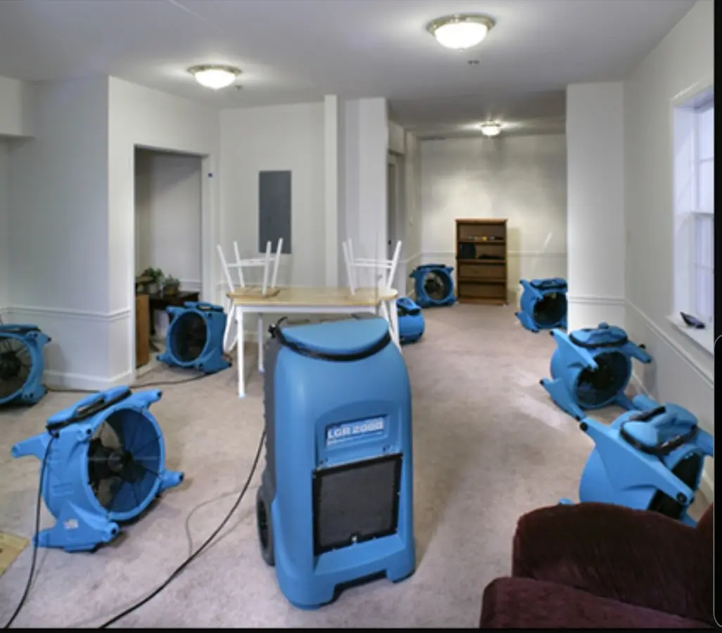Air movers and dehumidifier setup for Water Extraction & Removal in Brandon